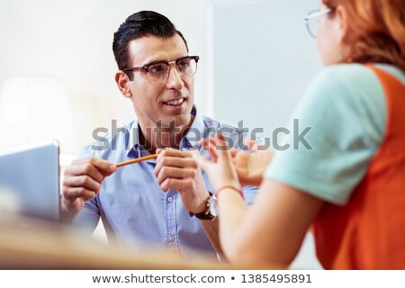 Stock photo: Young Man Explaning Lessons To His Friend