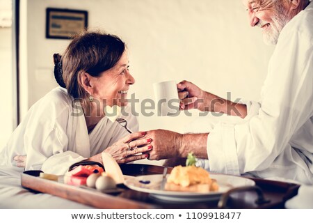 Stock fotó: Happy Aged Couple In Hotel Room