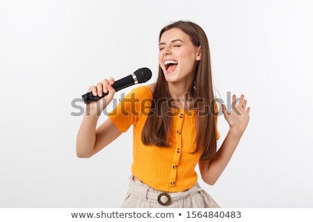 Stock fotó: Girl With Microphone