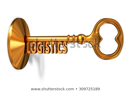Foto stock: Logistics - Golden Key Is Inserted Into The Keyhole
