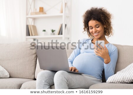 [[stock_photo]]: Pregnant Woman Enjoying Shopping