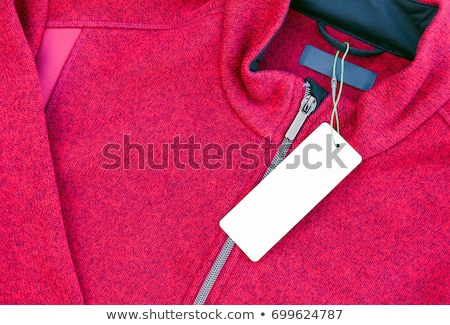 Сток-фото: Blank Clothing Label Tag On A Red Jacket