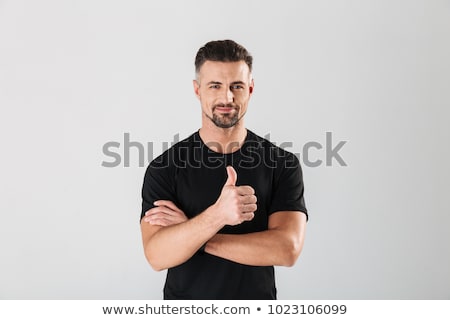 Foto stock: Athletic Man Showing Thumb Up