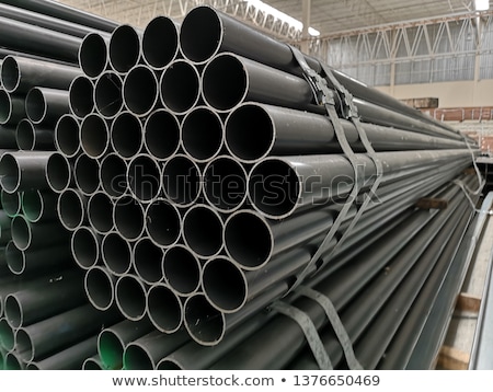 [[stock_photo]]: Stack Of Steel Pipes