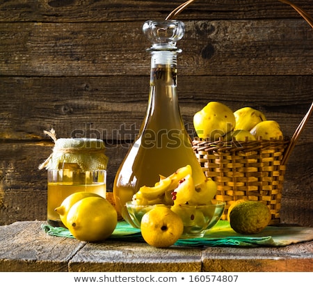 Stock photo: Alcohol Quince Liqueur Sliced Fruit Prepare Wooden Setting