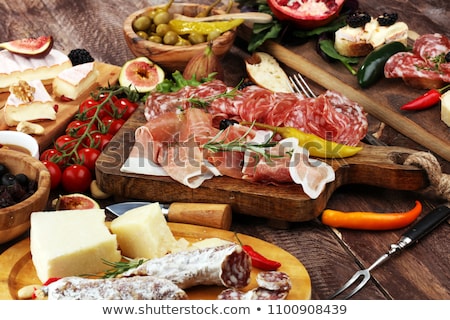 Foto stock: Italian Cuisine Antipasto Prosciutto Melon Salami Olives And Wine