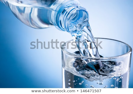 Stok fotoğraf: Mineral Water Bottles On Nature Background