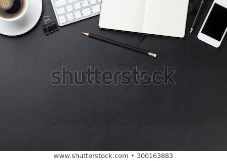 Foto stock: Office Leather Desk With Pc Smartphone And Coffee Cup