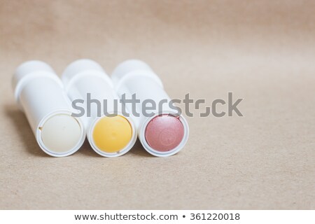 Moisturizer Lipstick On Brown Natural Background Stock foto © nalinratphi