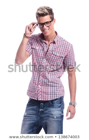 [[stock_photo]]: Smiling Casual Man Fixing His Glasses