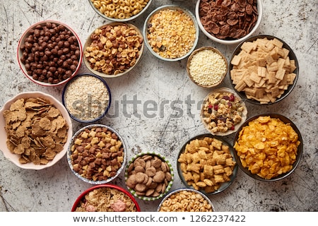 Zdjęcia stock: Assortment Of Different Kinds Cereals Placed In Ceramic Bowls On Table