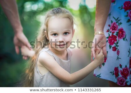 Stok fotoğraf: Daughter Holding Her Fathers Hand