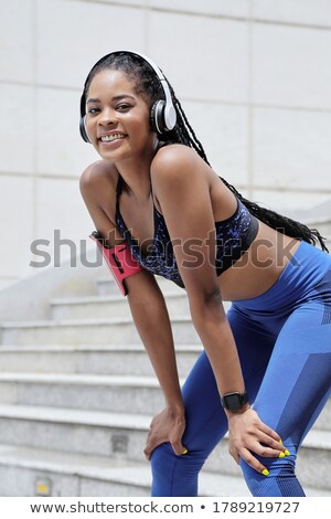 Zdjęcia stock: Portrait Of A Pretty Young African Sportswoman Resting