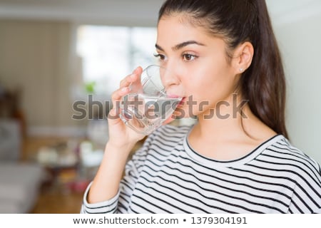 Сток-фото: Young Woman Drinking Water
