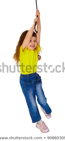 Cheerful Little Girl Hanging On A Rope Stockfoto © pzAxe
