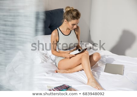 Stockfoto: Young Woman In Underwear At Home