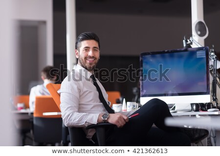 Arab Man Sitting At His Desk [[stock_photo]] © dotshock