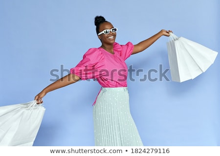 Stock photo: Image Of Fashionable Woman 20s Wearing Casual Clothing Holding F