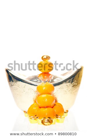 Tangerine With Large And Small Ingots At Background Stockfoto © Calvste