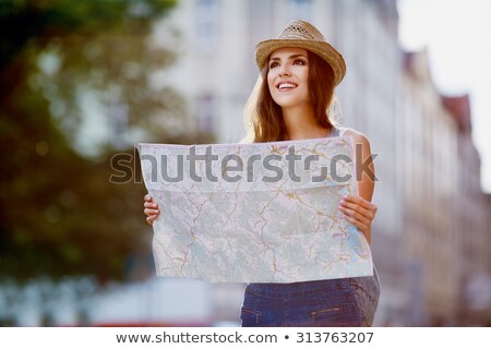 [[stock_photo]]: Blonde Girl With Map