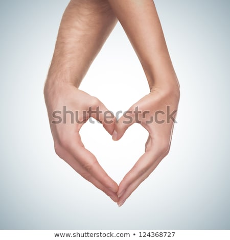 Young Man Shows Love Sign With Heart Shape Formed By Hands Foto d'archivio © doodko