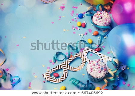 Stockfoto: Kids Birthday Party Decoration And Cake Decorated Table