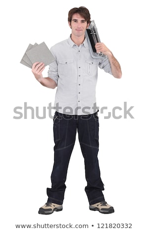 Сток-фото: Craftsman Holding Tiles