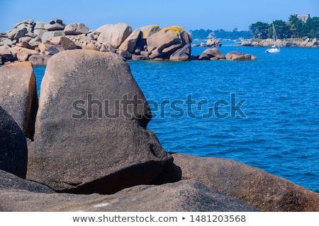 Zdjęcia stock: Huge Granite Boulder On Blue Sky Background