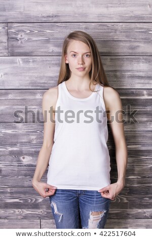 Foto stock: Pretty Girl In Casuals Sleeveless Top