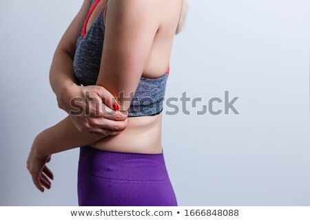 Foto d'archivio: Fit Woman With Elbow Injury