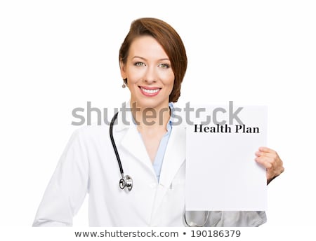 Stockfoto: Smiling Doctor Holding Percent Sign