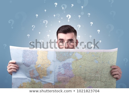 Zdjęcia stock: Young Man Holding Map