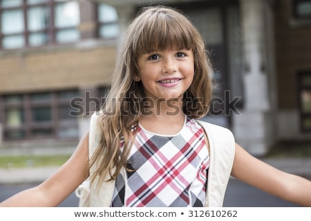 Zdjęcia stock: Eight Years Old School Girl Close To The Schoolyards