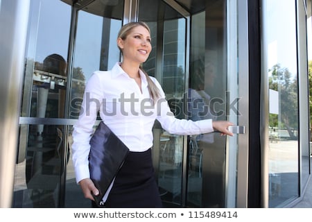 Stok fotoğraf: Pretty Manager Leaving Office Building