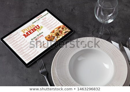 Stock fotó: Online Pizza Menu With Tableware Concept