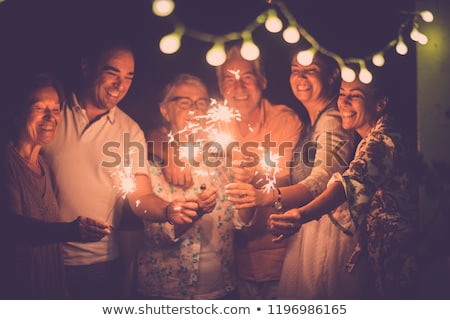 Stock photo: Men And Women Celebrating The New Year 2020