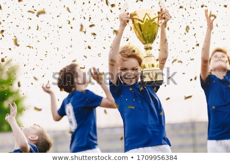 Happy Boy Rising Golden Trophy Child Winning Sports Competition Stockfoto © matimix