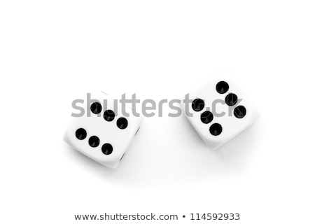 Stockfoto: Black Dice Against A White Background