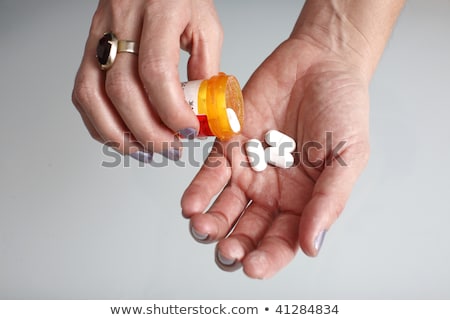 Foto stock: Pain Killers In A Hand