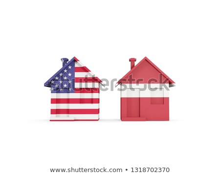 Zdjęcia stock: Two Houses With Flags Of United States And Latvia