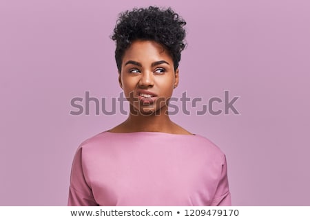 Foto d'archivio: Portrait Of An Irritated Young African Woman