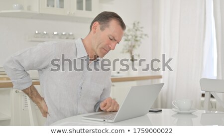 [[stock_photo]]: Businessman Having Backache At Work