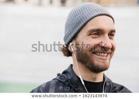 Stock fotó: Close Up Of A Motivated Young Fit Sportsman Listening To Music