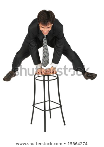 [[stock_photo]]: Businessman Jumps Above Stool