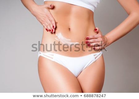 Stock foto: Weight Loss Woman Apply Cellulite Cream