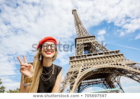 Stockfoto: Girl And The Eiffel Tower