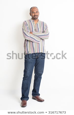 Casual Man Poses On White With Shadow Foto d'archivio © szefei