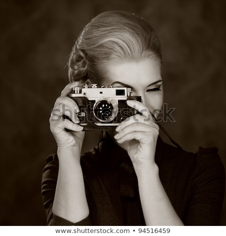 Foto stock: Beautiful Lady With Retro Photo Camera
