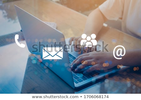 Stockfoto: Contact Us Message On Notebook