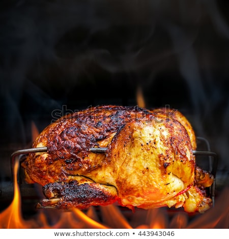 Stok fotoğraf: Grilled Barbecue Chicken Over Flame With Steam